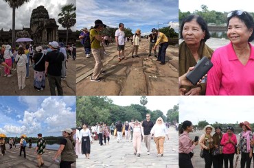ភ្ញៀវទេសចរជាតិ និងអន្តរជាតិ បង្ហាញពីមោទកភាពនៅពេលបានដើរឆ្លងកាត់ស្ពានហាលប្រាសាទអង្គរវត្ត